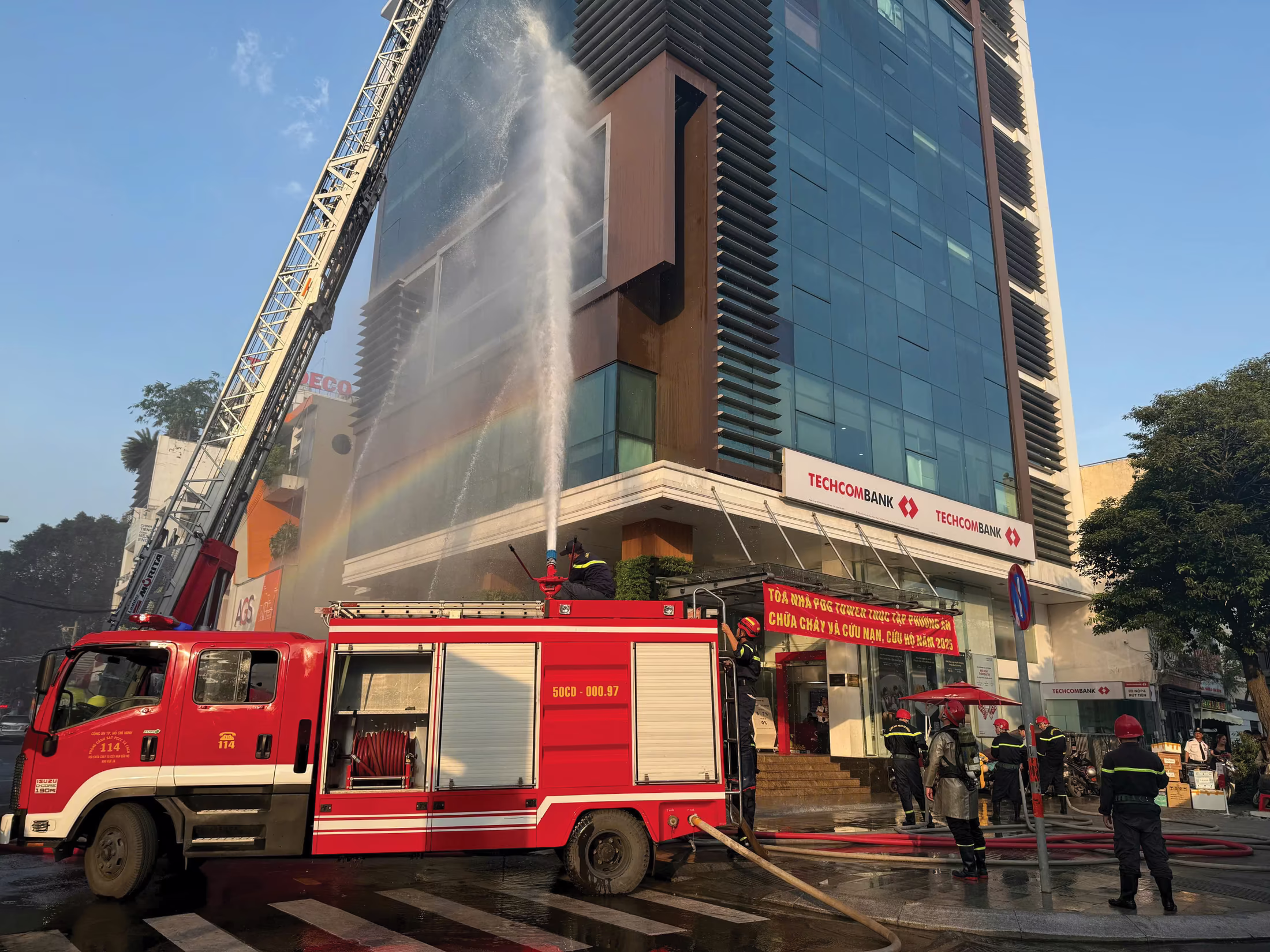 Fire safety drill and operations scene outside an office building